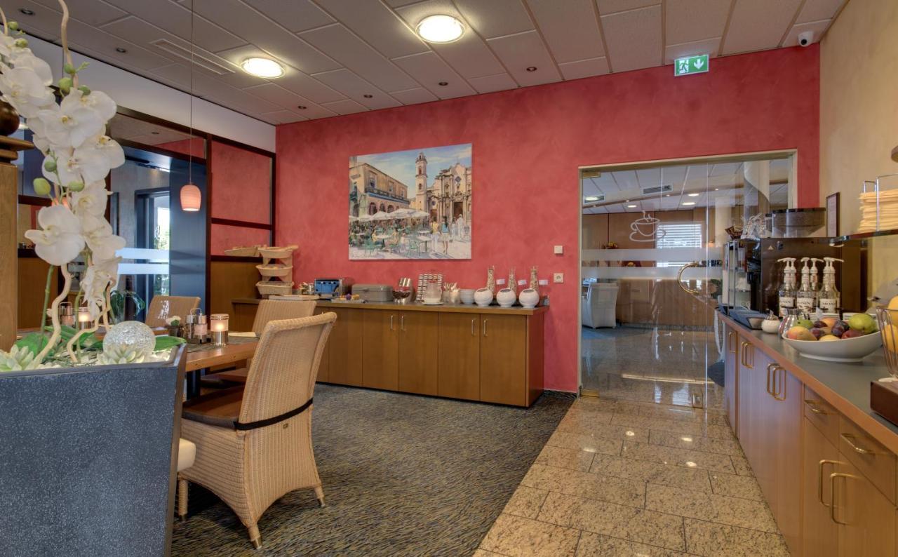 Hotel Merkur Ландштуль Экстерьер фото